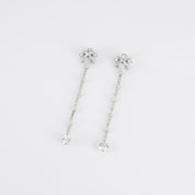 Boucles d'oreilles pendantes, or blanc et diamants