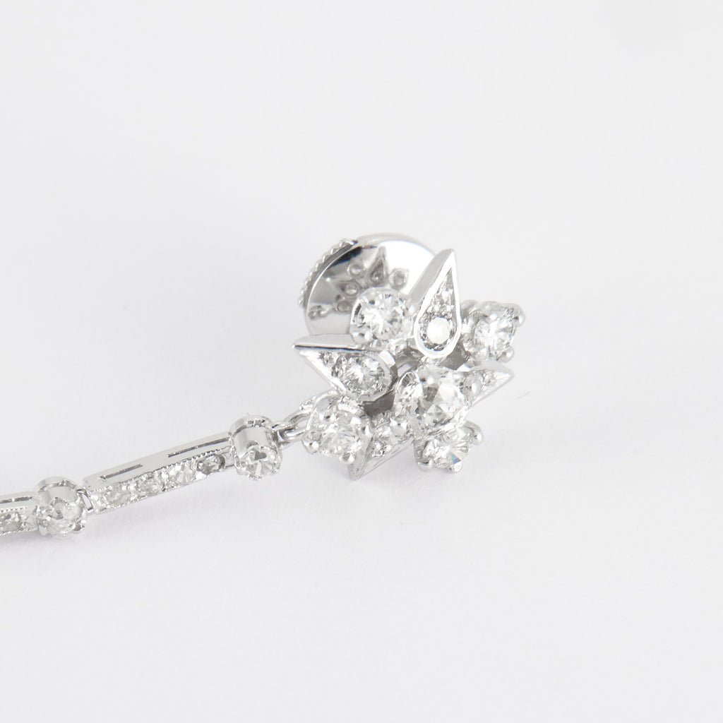 Boucles d'oreilles pendantes, or blanc et diamants