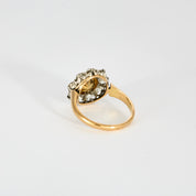 Bague marguerite en or jaune diamants et centre perle.