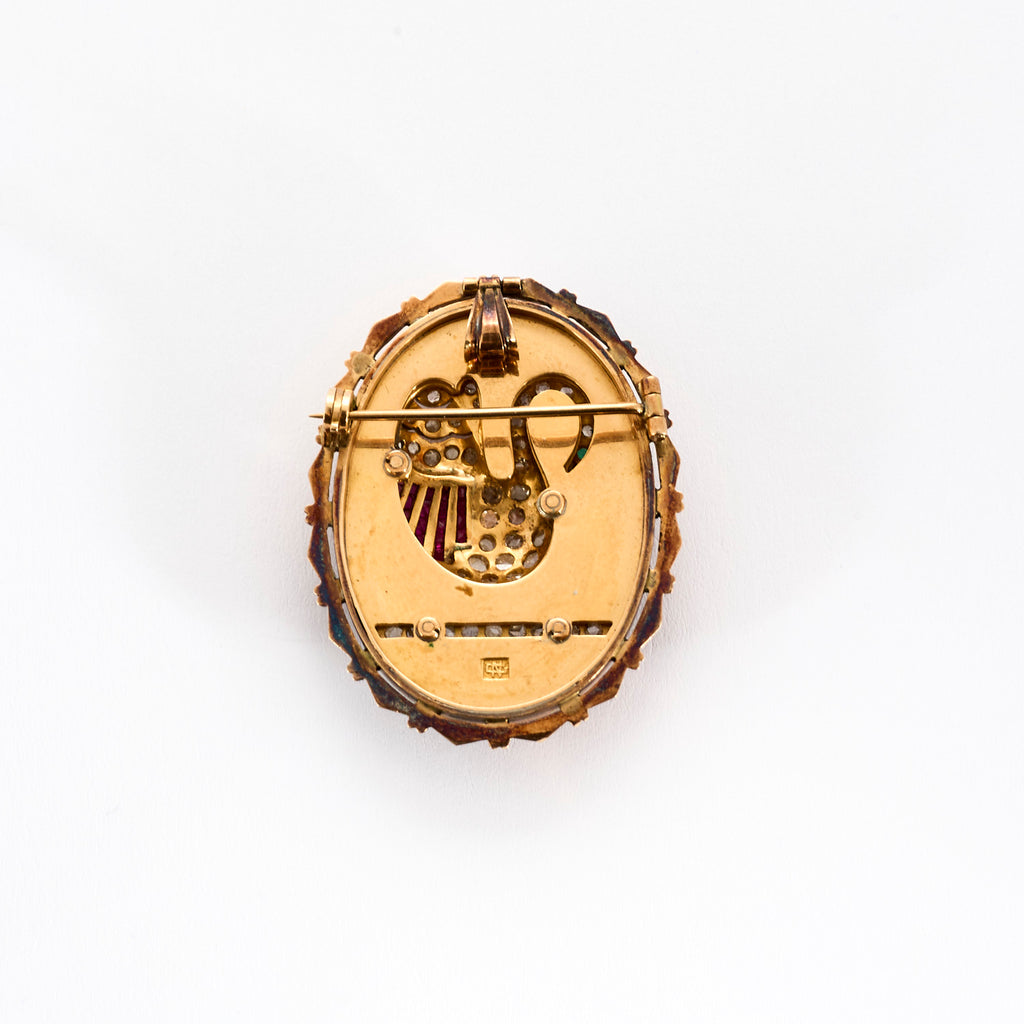 Broche/pendentif début XX en or et diamants.