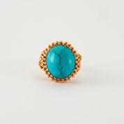 Bague cabochon turquoise en or rose.