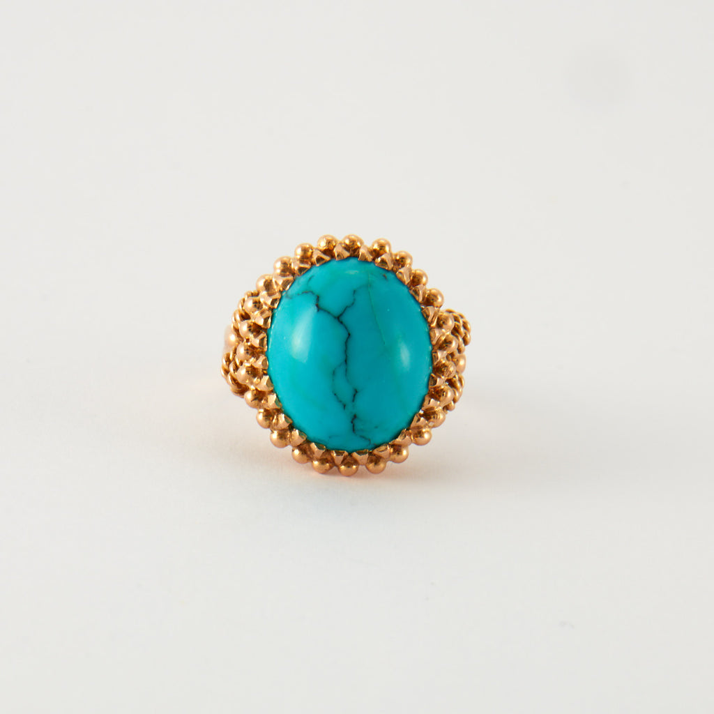 Bague cabochon turquoise en or rose.