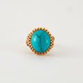 Bague cabochon turquoise en or rose.