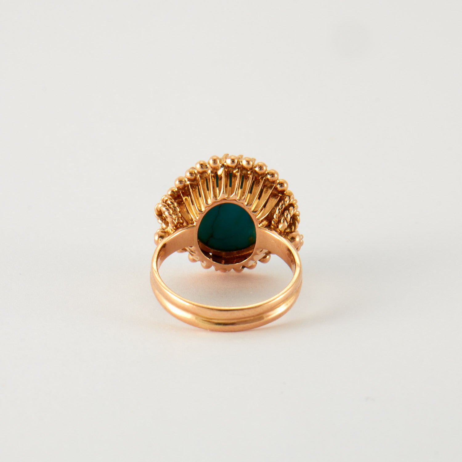 Bague cabochon turquoise en or rose.