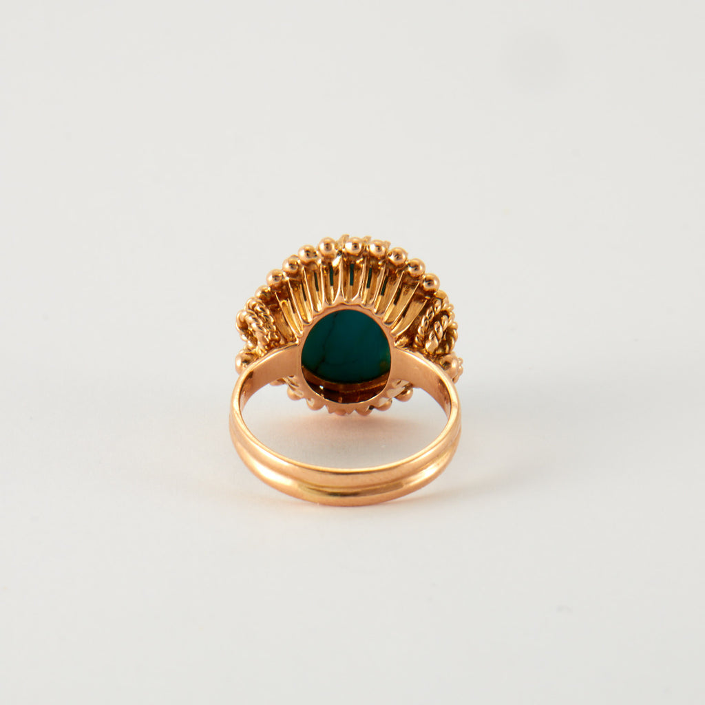 Bague cabochon turquoise en or rose.