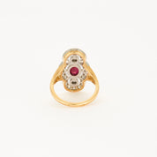 Bague style "Art Deco" en or jaune, platine, diamants et centre rubis