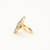 Bague style "Art Deco" en or jaune, platine, diamants et centre saphir.