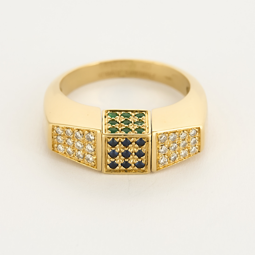 Bague en or jaune et centre pivotant serti de diamants, rubis, émeraudes et saphirs