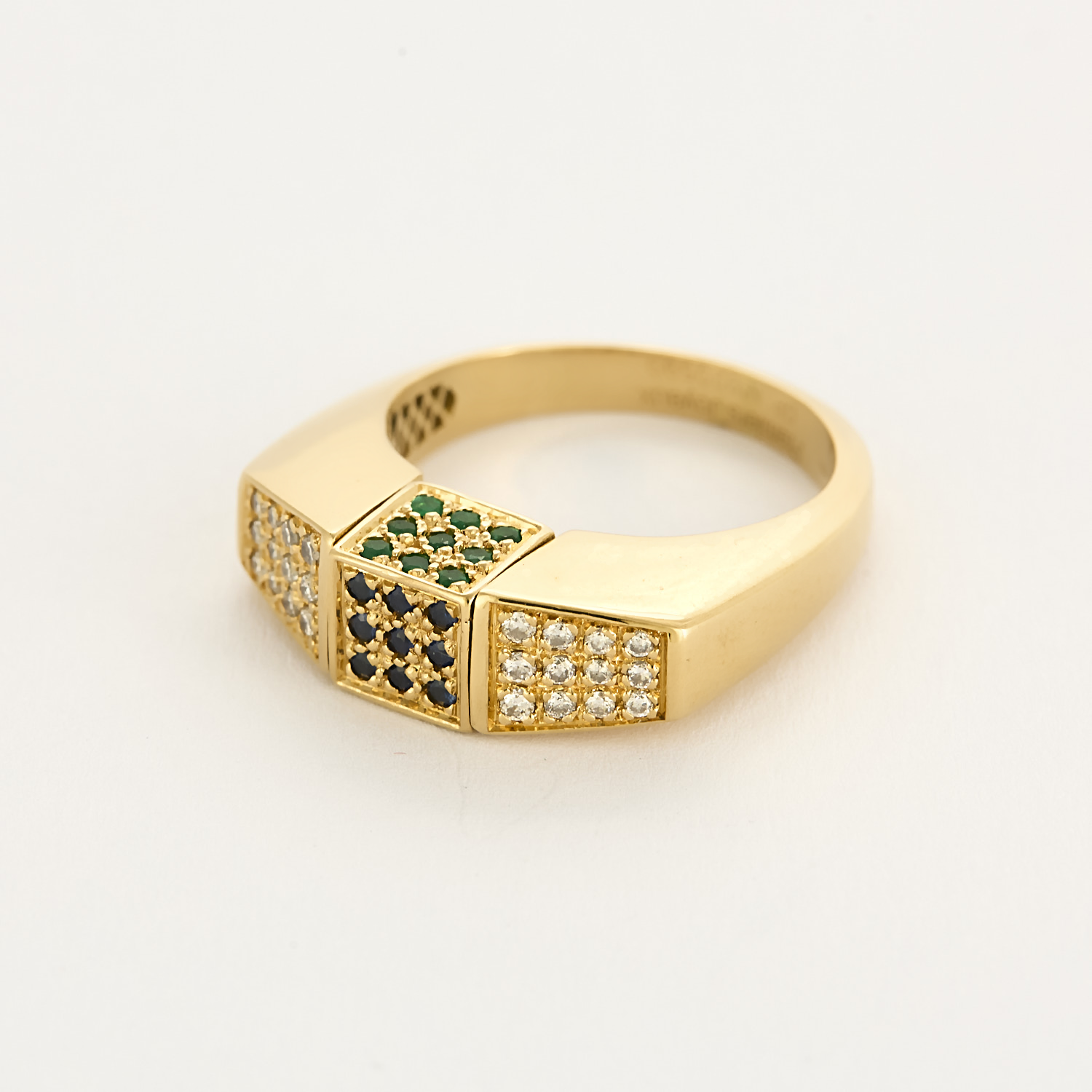 Bague en or jaune et centre pivotant serti de diamants, rubis, émeraudes et saphirs