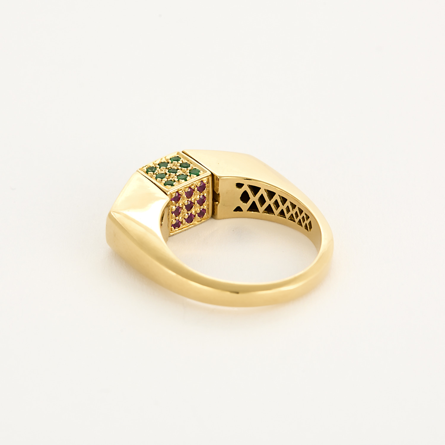 Bague en or jaune et centre pivotant serti de diamants, rubis, émeraudes et saphirs