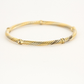 Bracelet jonc en or jaune et or blanc torsadé