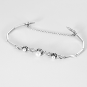 Bracelet ancien en or blanc, diamants et 3 perles.