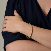 Bracelet jonc en or jaune et or blanc torsadé