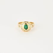 Bague vintage en or jaune, diamants et émeraude.