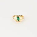 Bague vintage en or jaune, diamants et émeraude.
