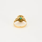 Bague vintage en or jaune, diamants et émeraude.