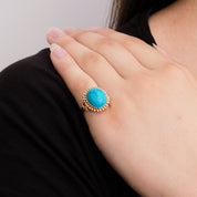 Bague cabochon turquoise en or rose.