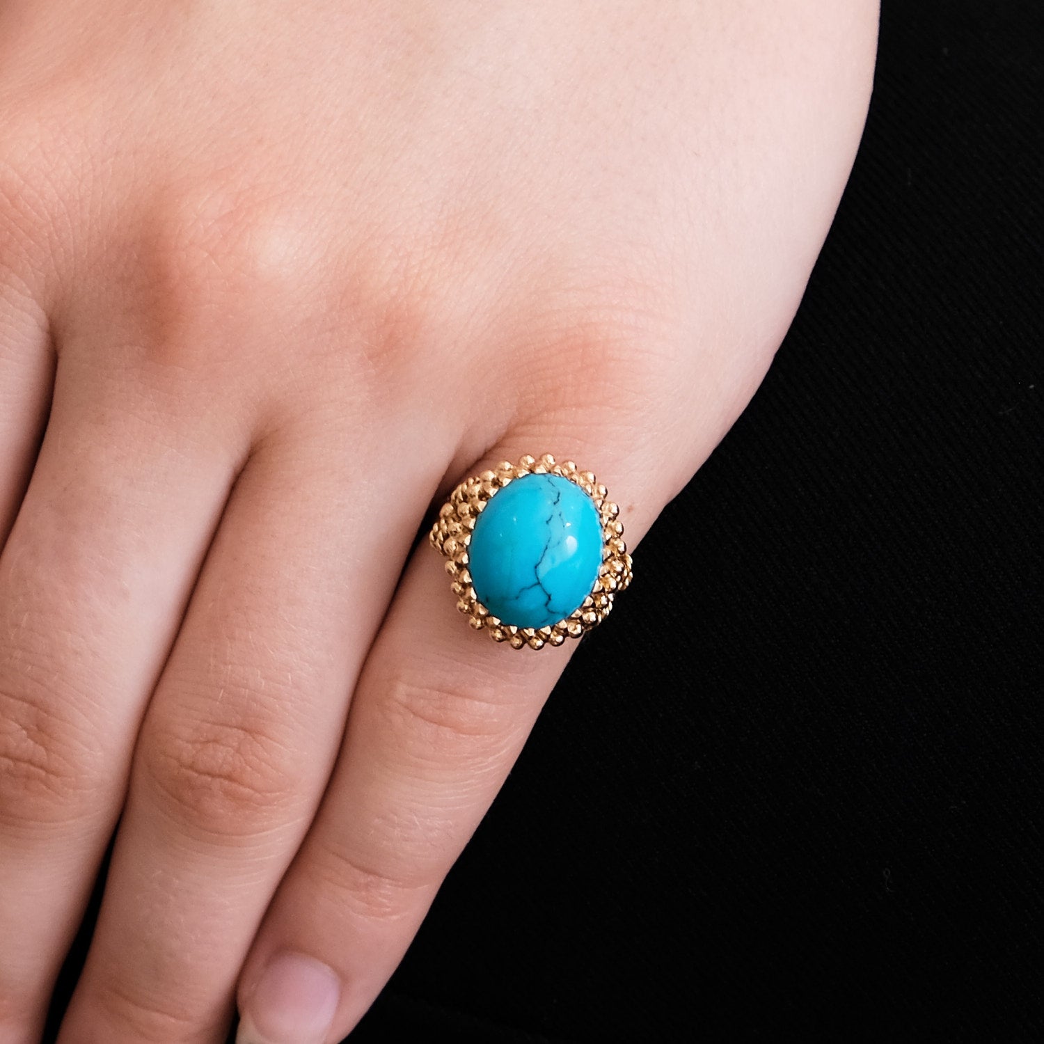 Bague cabochon turquoise en or rose.