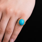 Bague cabochon turquoise en or rose.