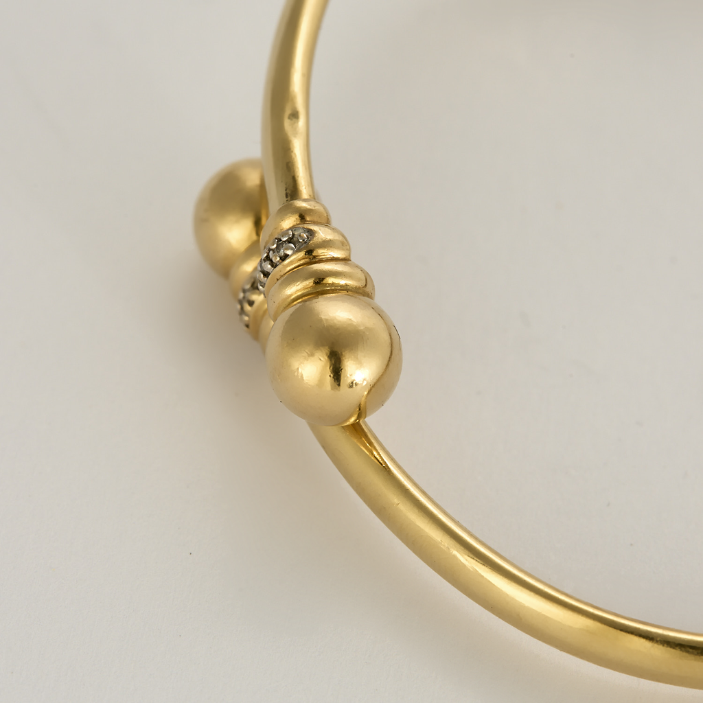 Bracelet ancien style jonc en or jaune et diamants