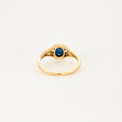 Bague en or jaune avec Saphir.