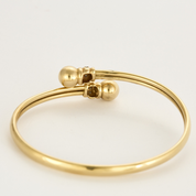 Bracelet ancien style jonc en or jaune et diamants