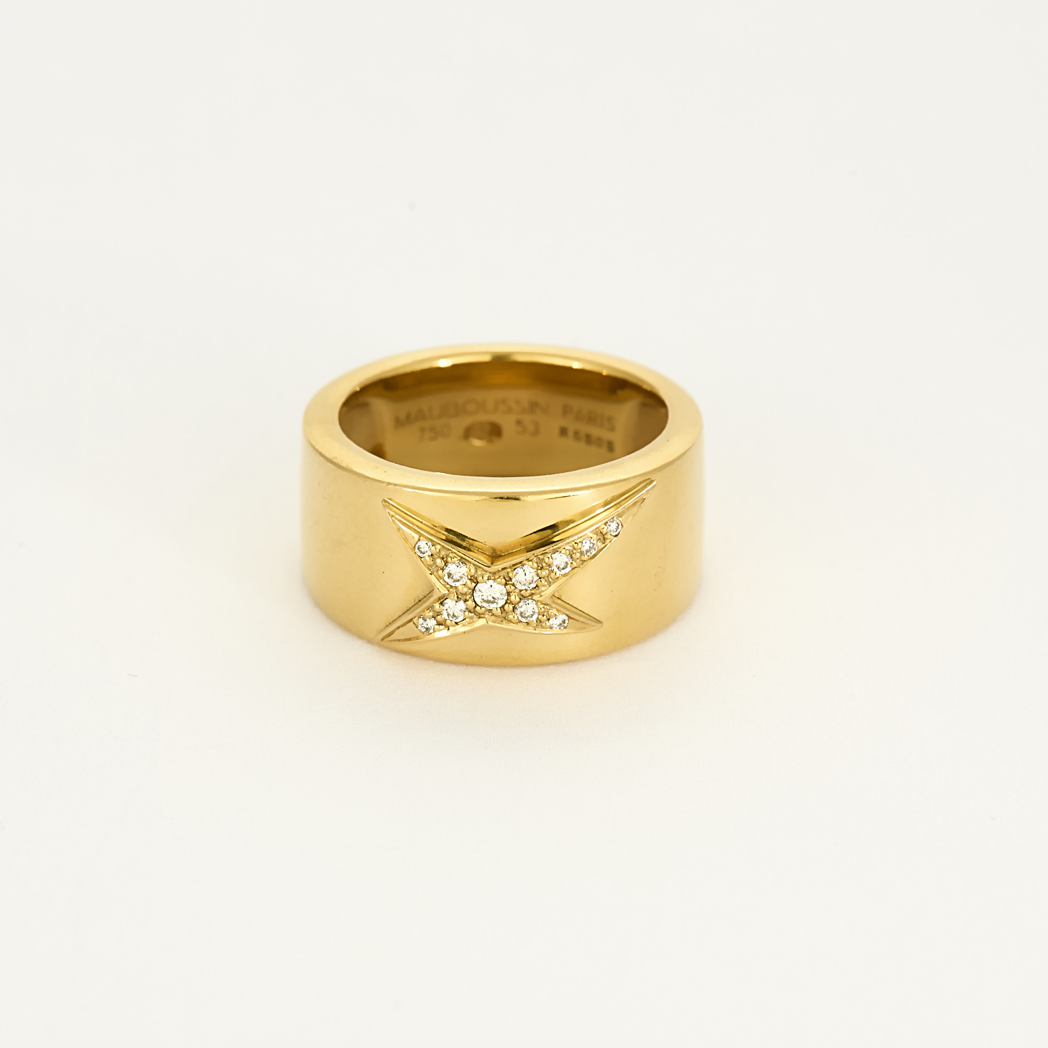 Bague "Mauboussin" étoile divine en or jaune et diamants