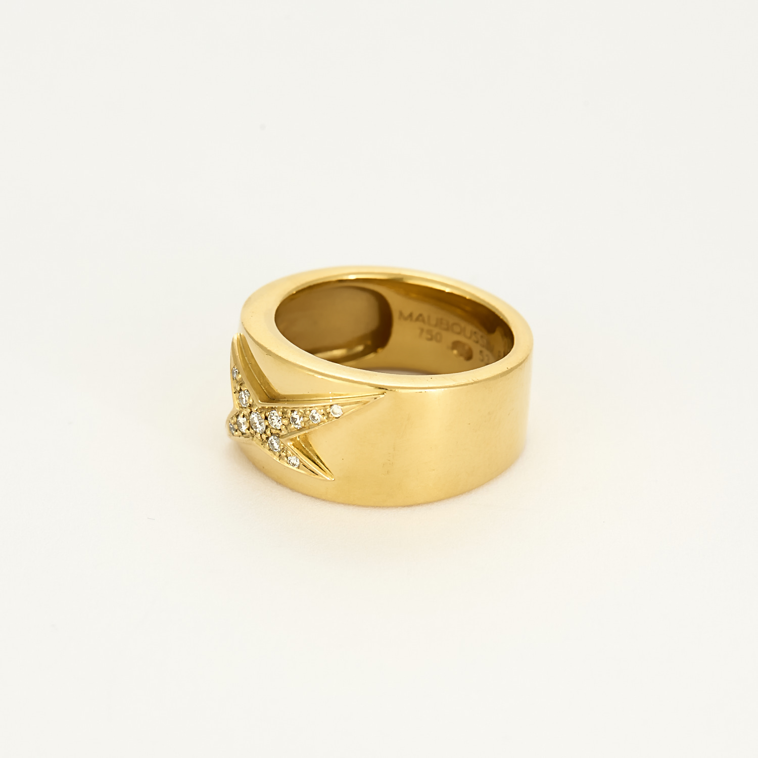 Bague "Mauboussin" étoile divine en or jaune et diamants