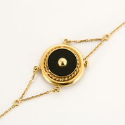 Bracelet vintage or jaune et onyx