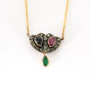 Collier en or, diamants, saphir, rubis et émeraude.