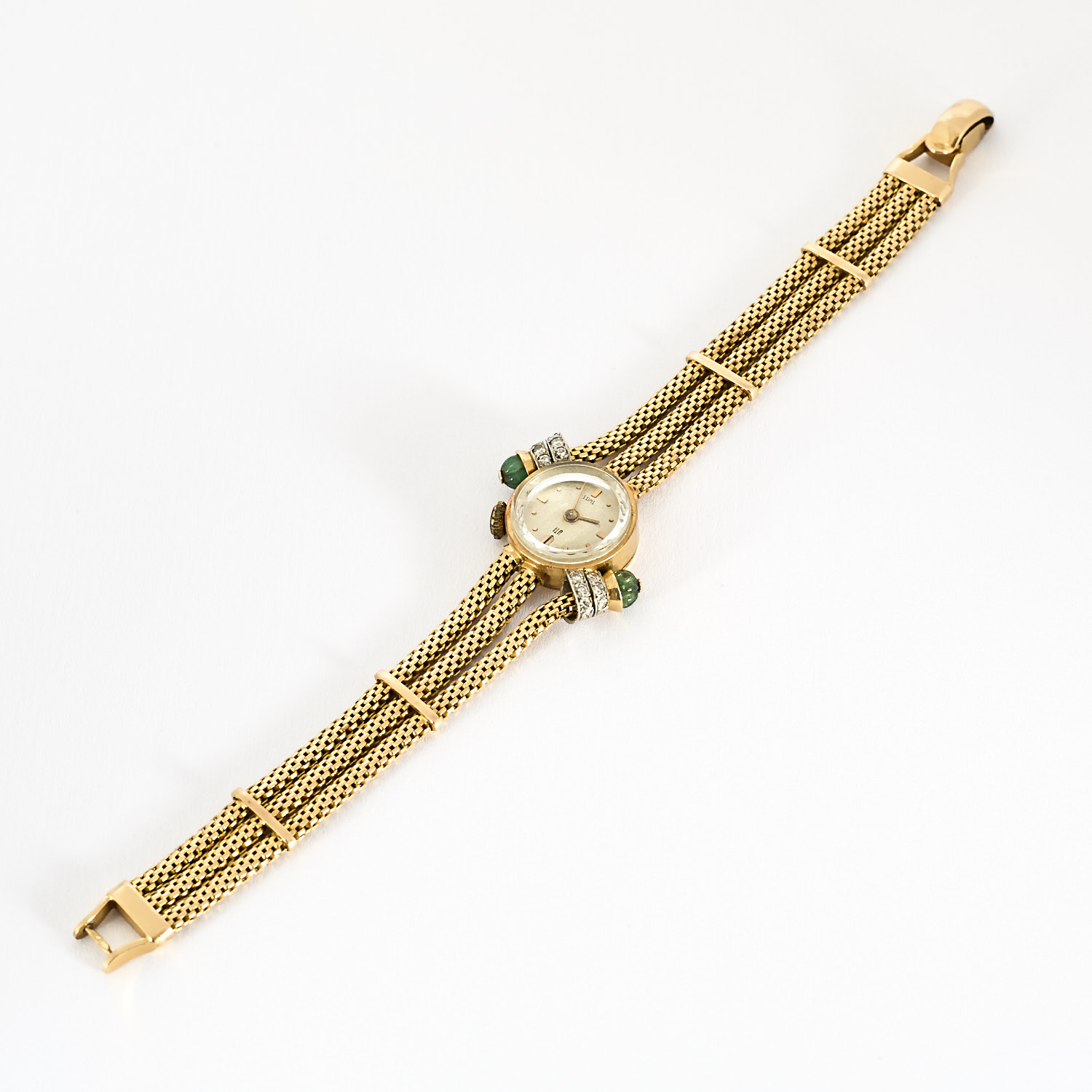 Montre ancienne UTI en or jaune