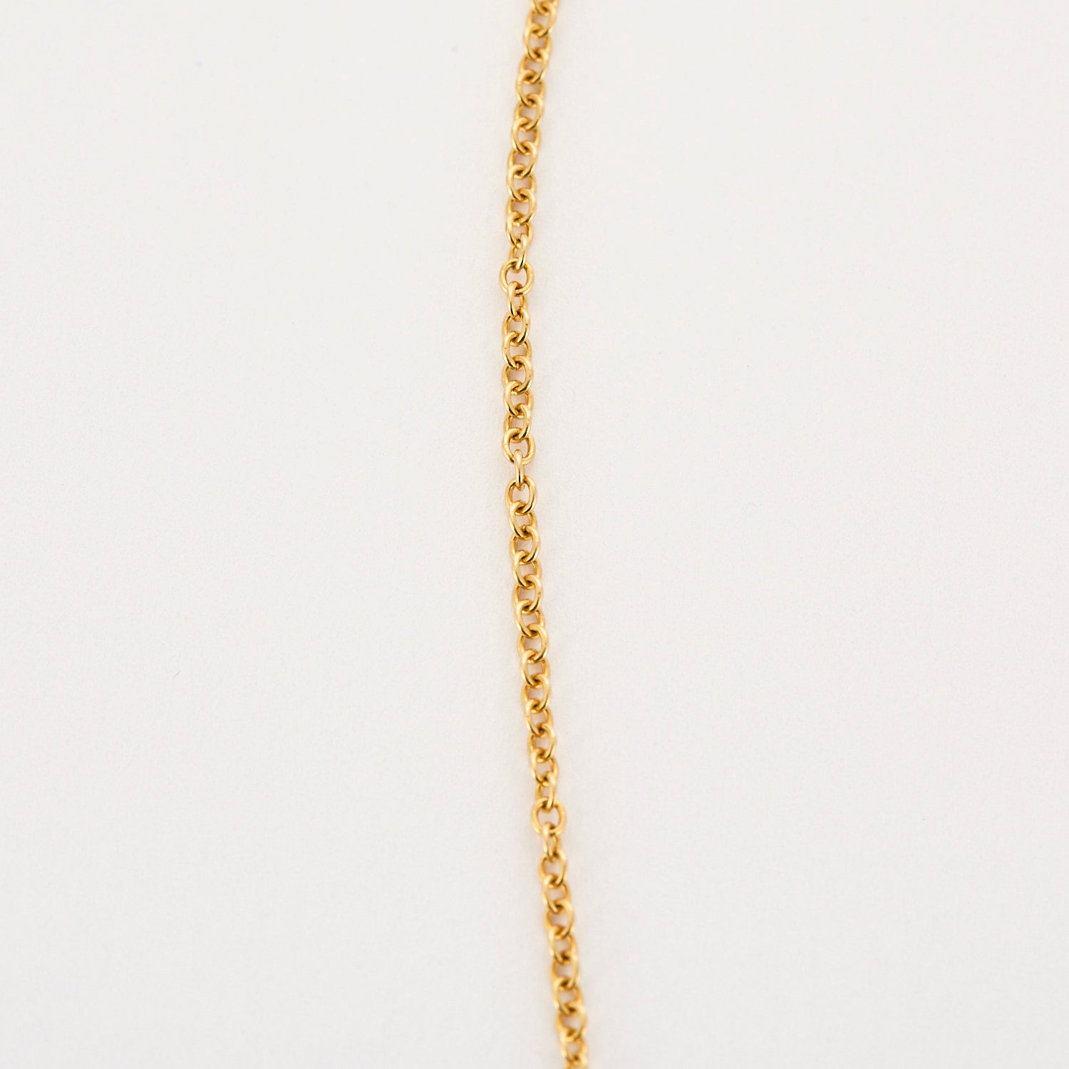Collier en or, diamants, saphir, rubis et émeraude.