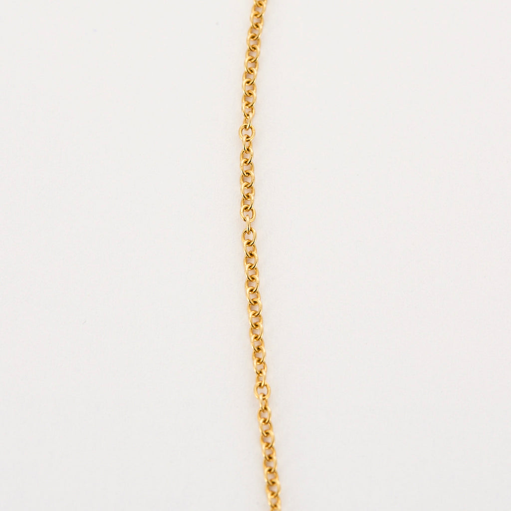Collier en or, diamants, saphir, rubis et émeraude.