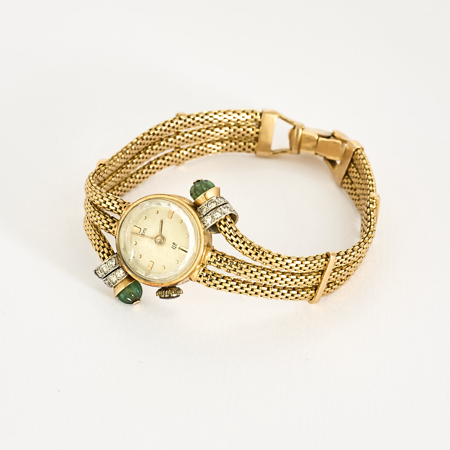Montre ancienne UTI en or jaune