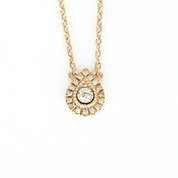 Collier mini poire en or rose et diamants.