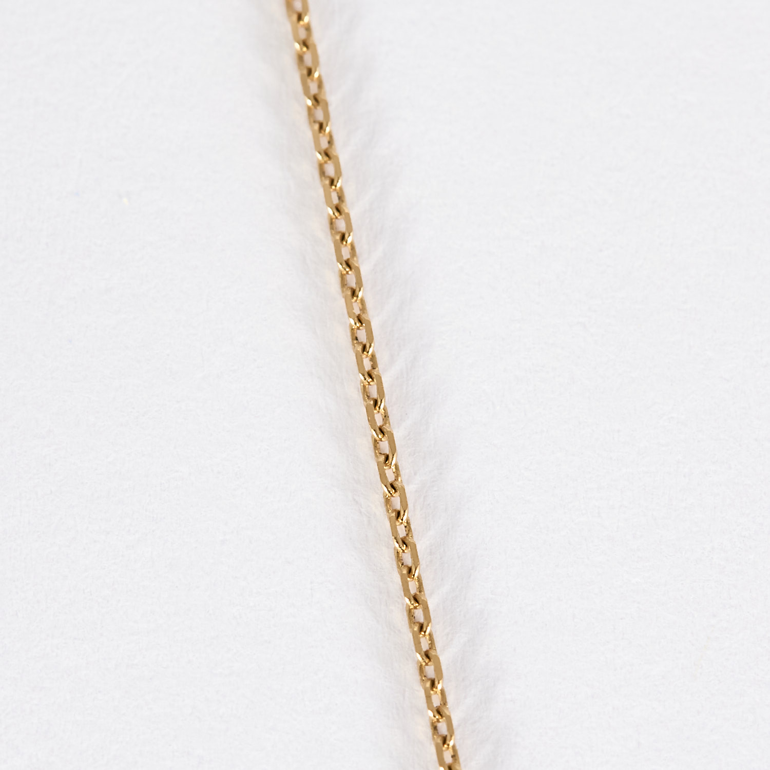 Collier mini poire en or rose et diamants.
