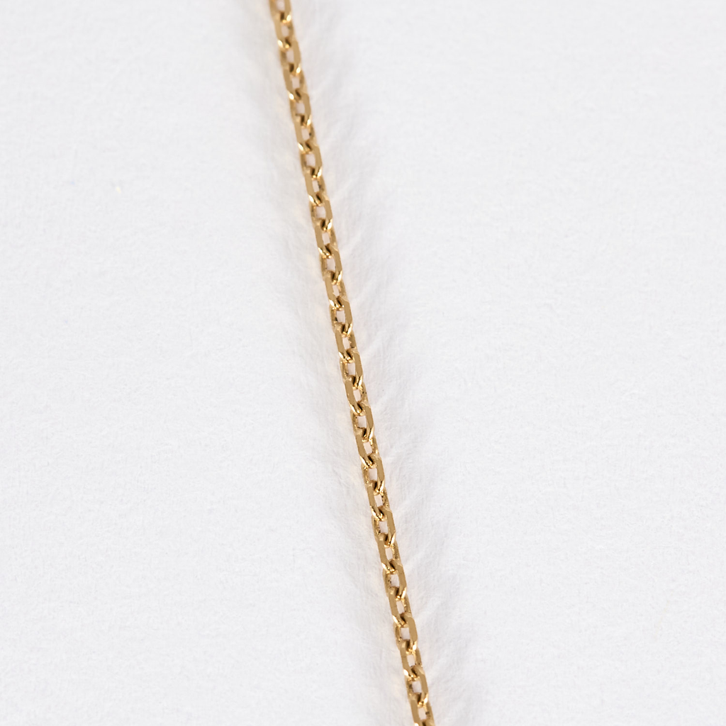 Collier mini poire en or rose et diamants.