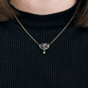 Collier en or, diamants, saphir, rubis et émeraude.