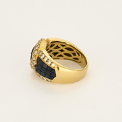 Bague vintage en or jaune, diamants et saphirs.