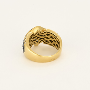 Bague vintage en or jaune, diamants et saphirs.