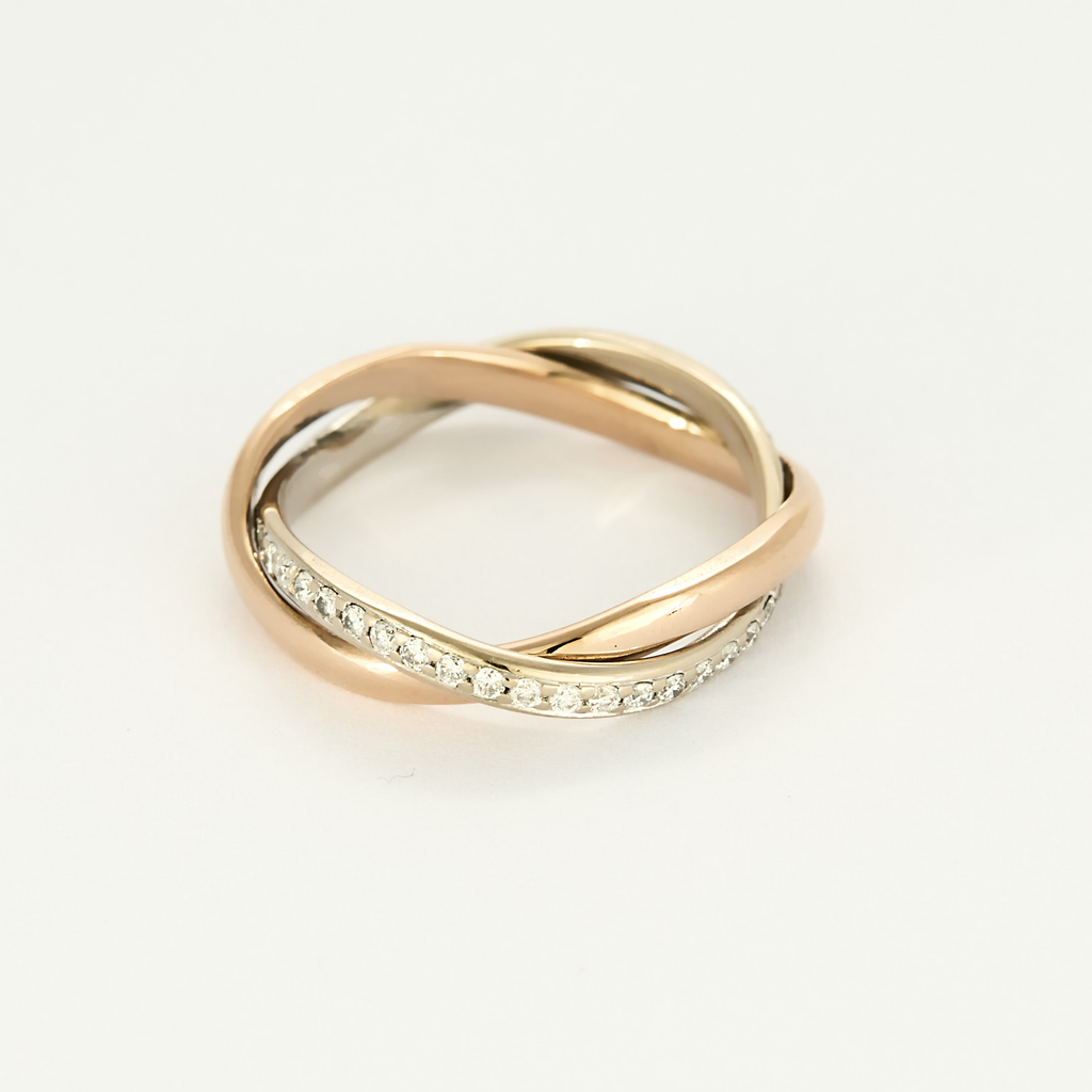 Bague Poiray "Tresse" en or rose & or blanc pavée.