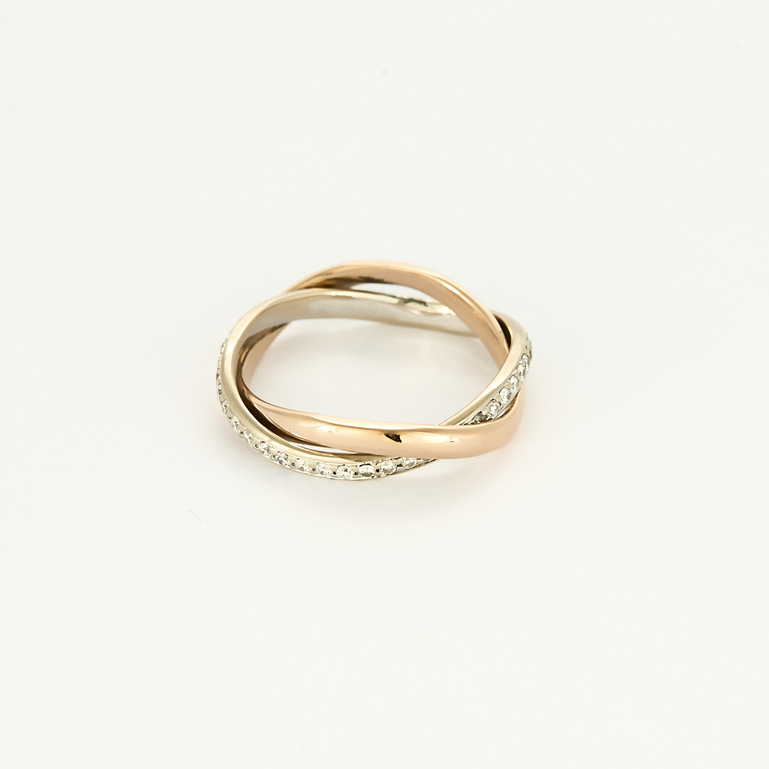 Bague Poiray "Tresse" en or rose & or blanc pavée.