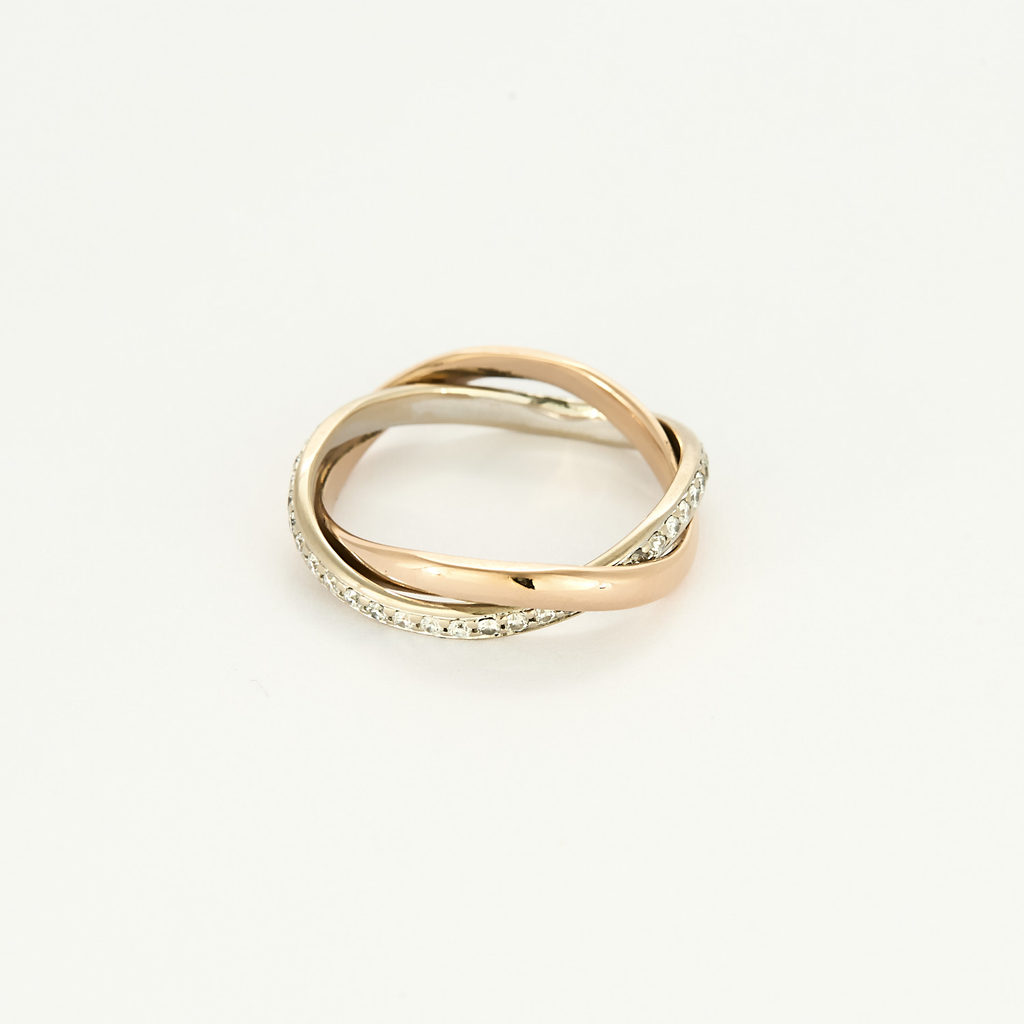 Bague Poiray "Tresse" en or rose & or blanc pavée.