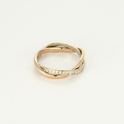 Bague Poiray "Tresse" en or rose & or blanc pavée.