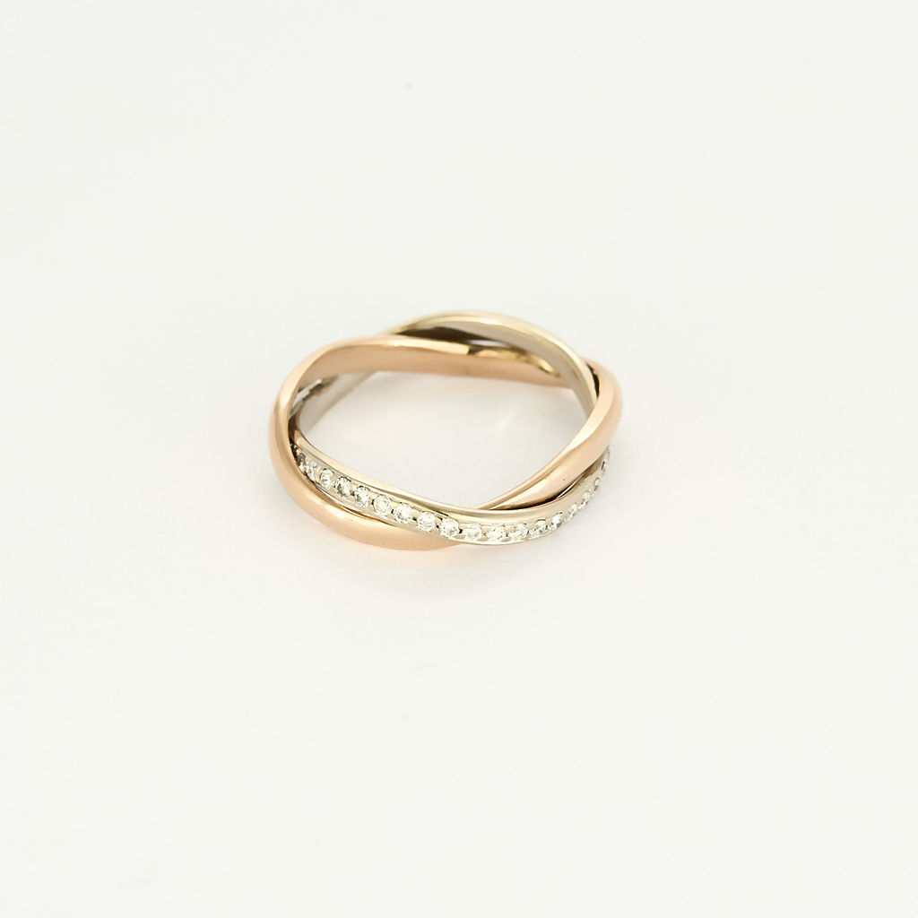 Bague Poiray "Tresse" en or rose & or blanc pavée.
