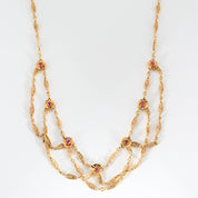 Collier filigrane collerette en or et rubis