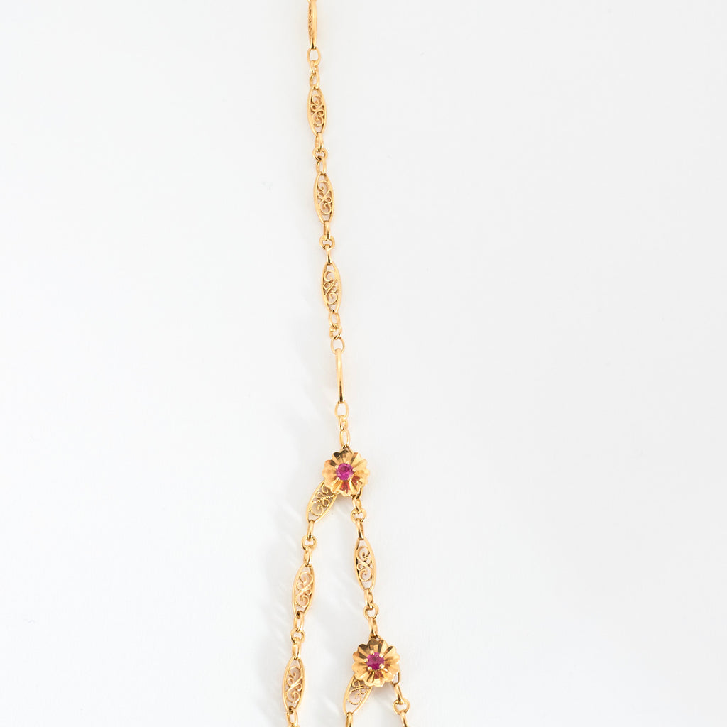 Collier filigrane collerette en or et rubis