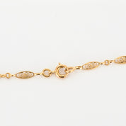Collier filigrane collerette en or et rubis