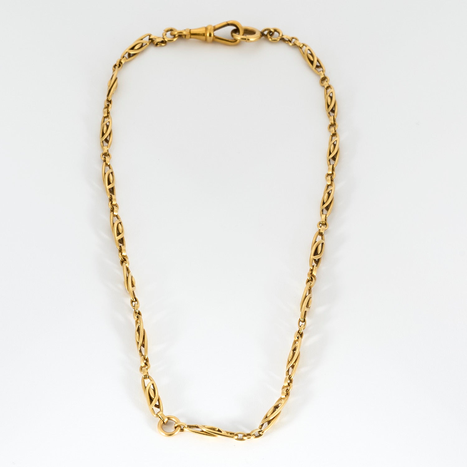 Collier filigrane collerette en or et rubis