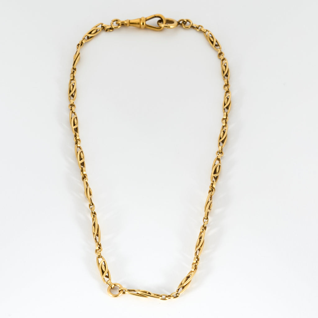 Collier filigrane collerette en or et rubis